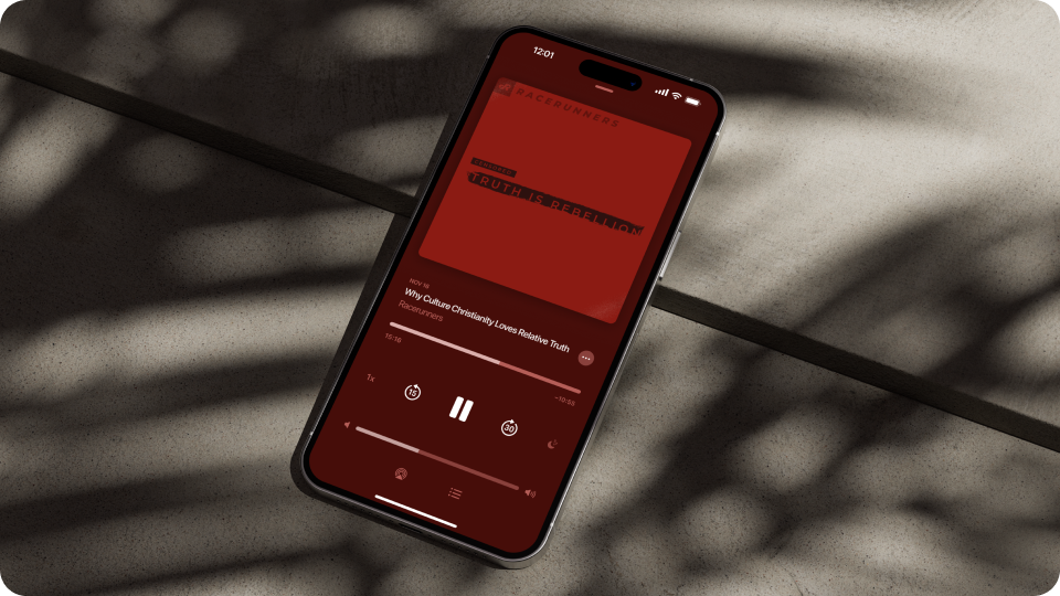 RaceRunners podcast episode playing on a phone with Truth Is Rebellion cover art